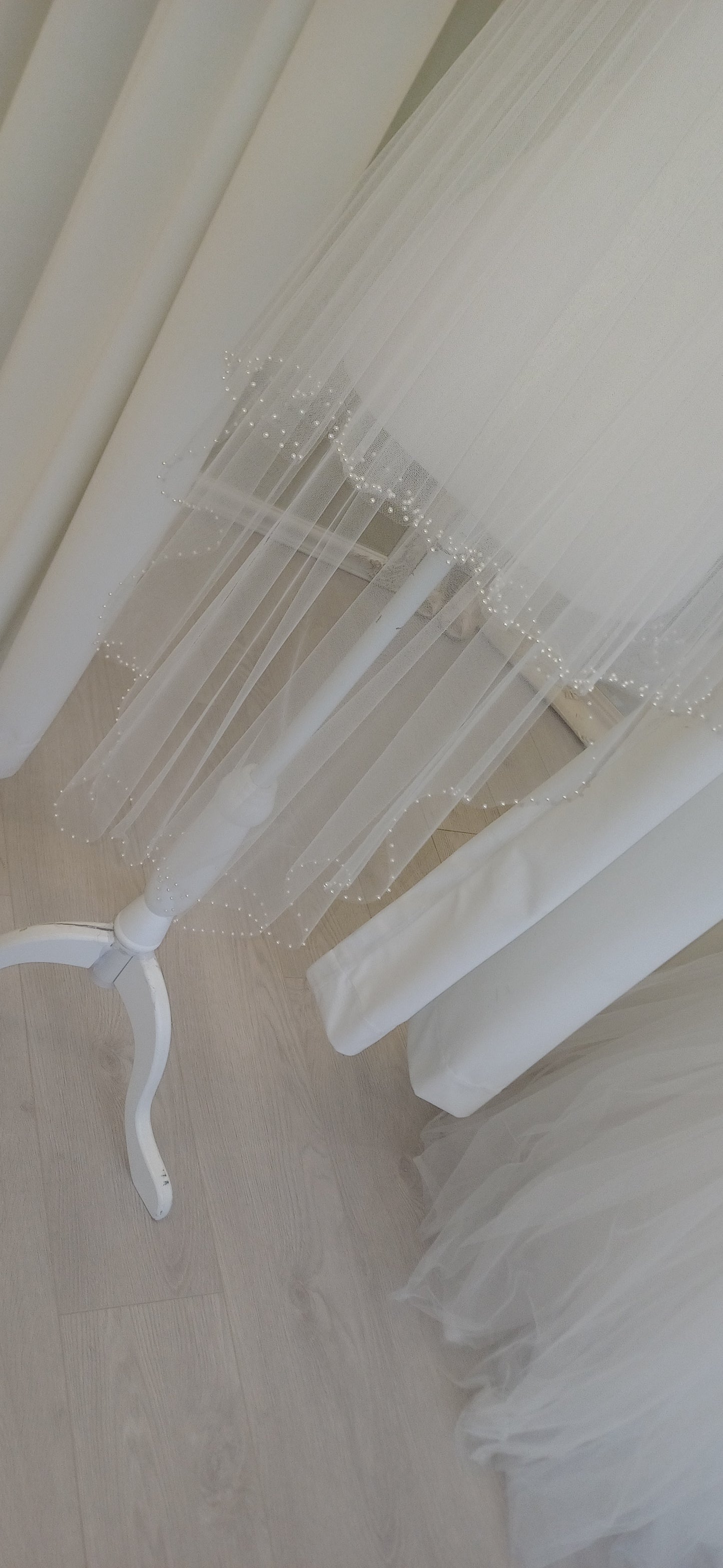 Delicate pearl edged 2 tier fingertip veil