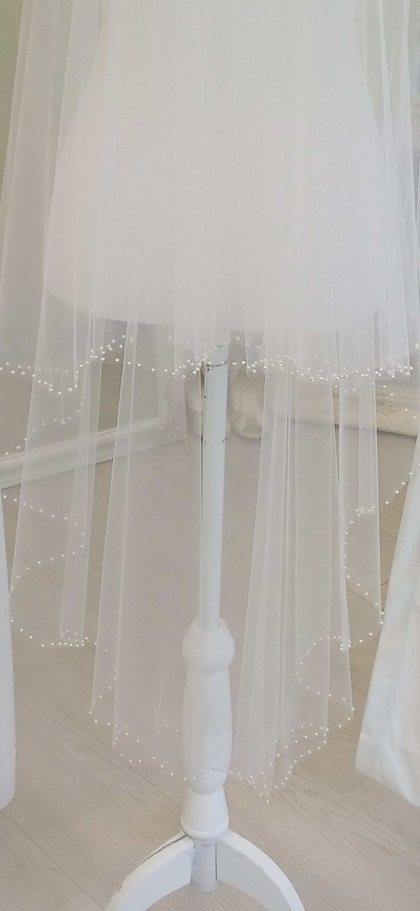 Delicate pearl edged 2 tier fingertip veil